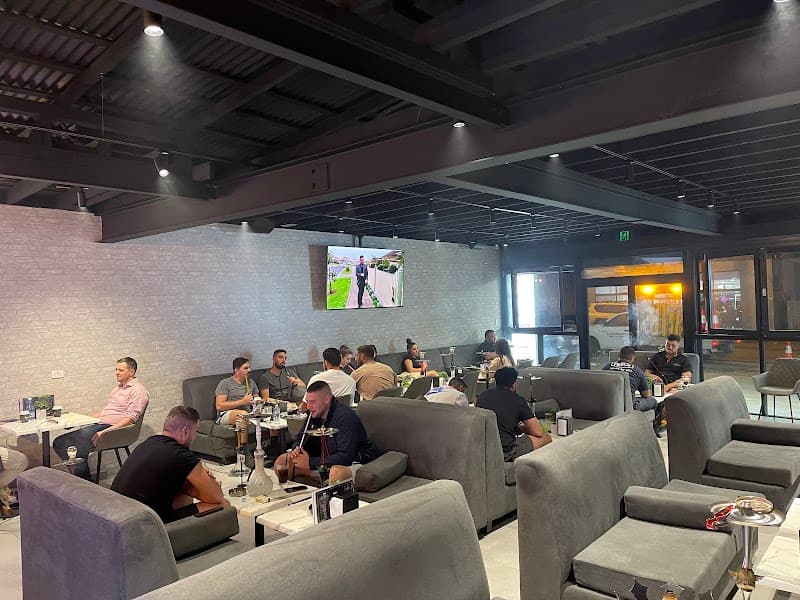 The Premium Lounge interior with warm ambient lighting